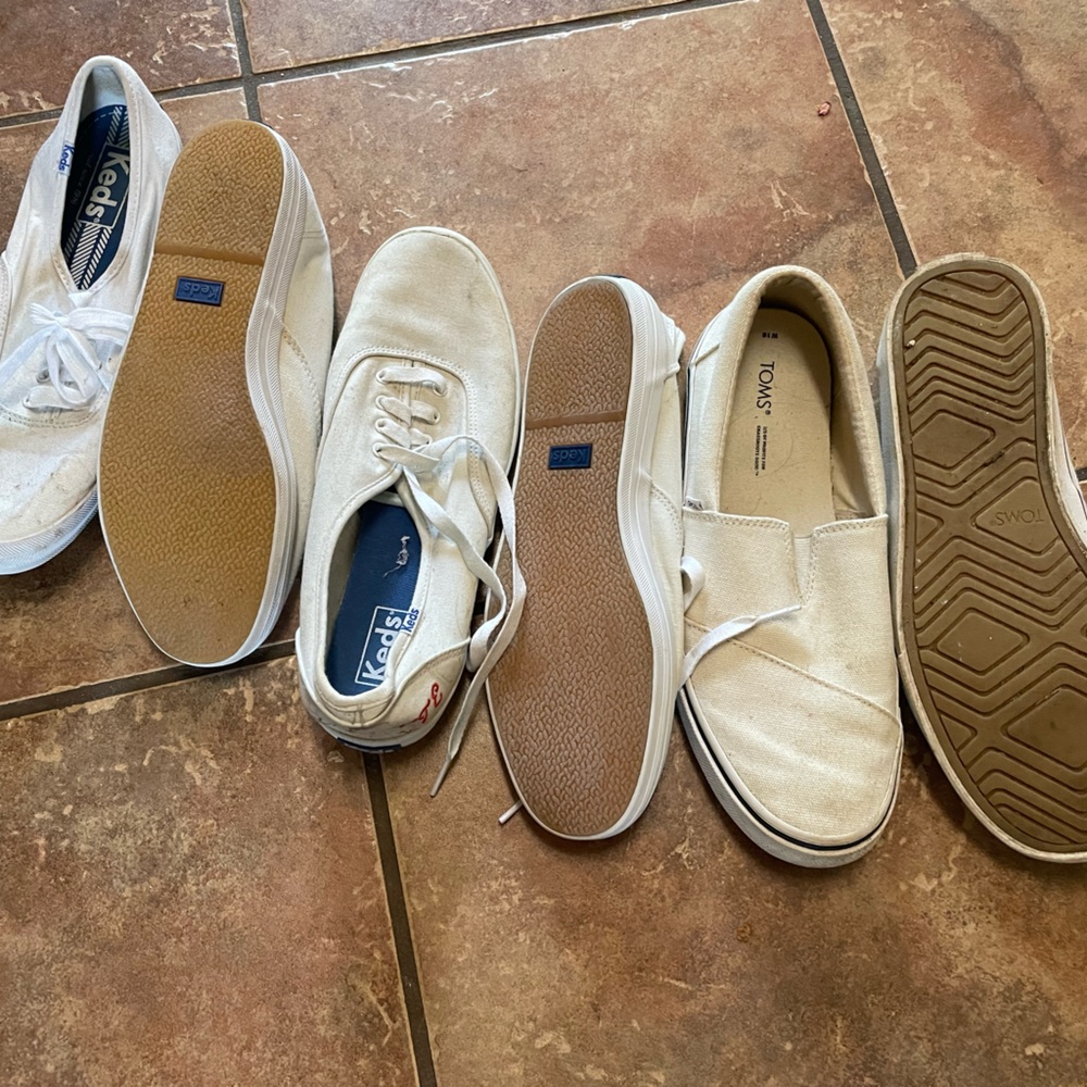 3 pair of used sneakers one pair of Tom’s and two keds,